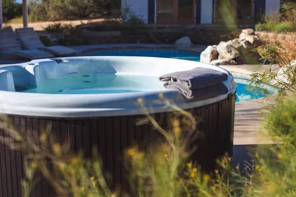 West & Wild · Stylish Retreat with Pool & Hot Tub - Image 3